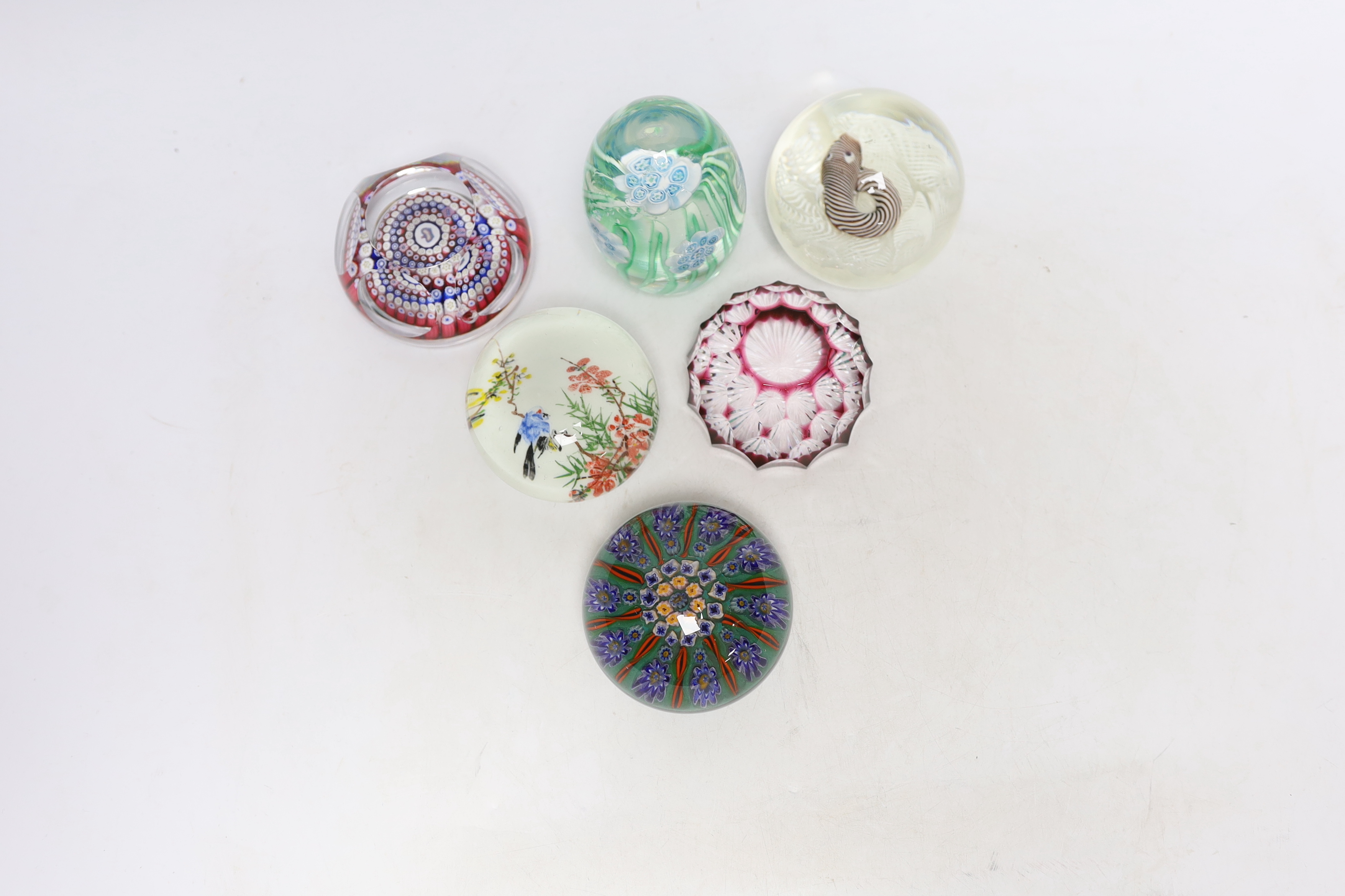 A group of six Whitefriars and other paperweights, tallest 10cm high